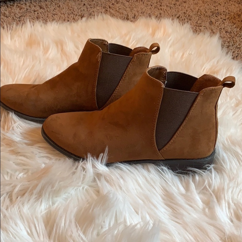 Woman’s brown booties